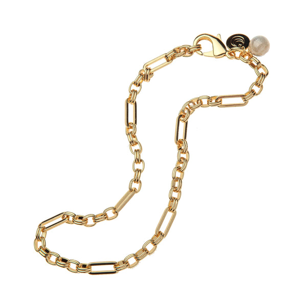 The Jane Win Across All Time Chain Necklace features alternating elongated and oval gold links, an oversized lobster clasp, and a labradorite bead accent near the closure, shown on a white background.