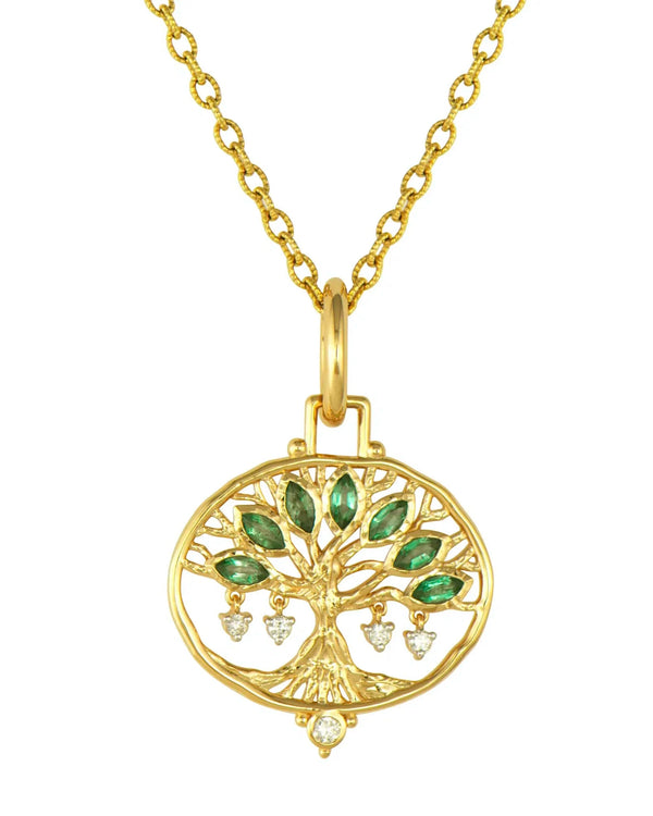 The Large Open Tree Of Life Pendant by Three Stories Jewelry features a round 14K gold pendant with a tree design, accented with emerald leaves and sparkling diamond-like gemstones resembling fruits or drops.
