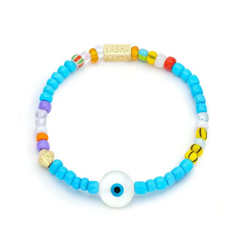 From Aaron Bashas Basha Besties Collection, this Womens White & Turquoise Beaded Stretch Bracelet boasts vibrant blue, yellow, orange, white, purple, and patterned beads. It includes an Evil Eye bead and features a standout white bead with a black dot alongside a gold-plated BASHA AARON bead.