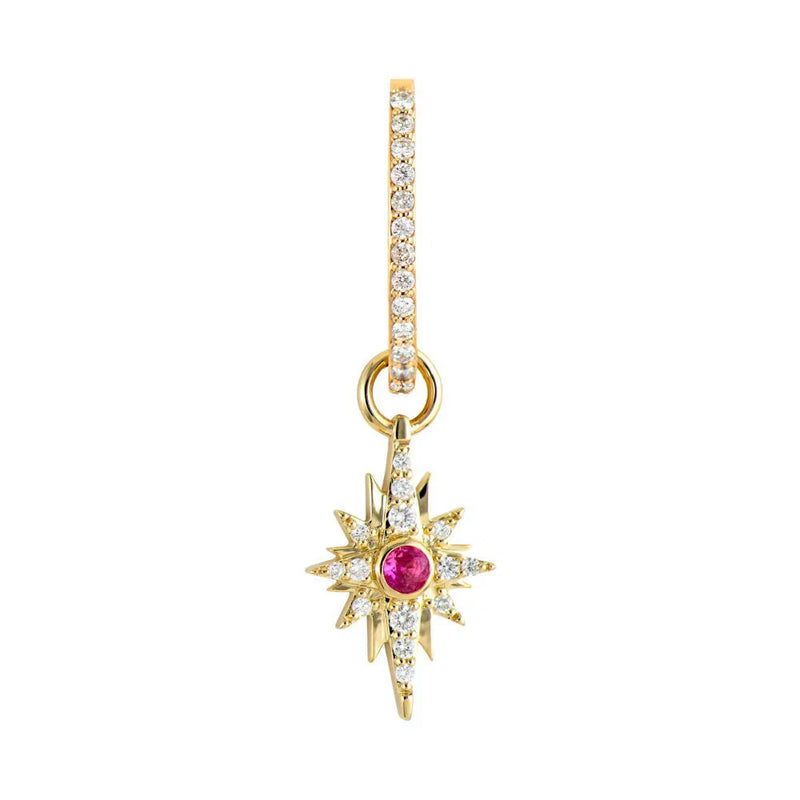 Three Stories Jewelrys Small Shooting Star Charms feature a 14K yellow gold drop design with a diamond-studded star, centered by a small red stone. The hoop is elegantly adorned with diamonds, offering a perfect blend of sparkle and sophistication.