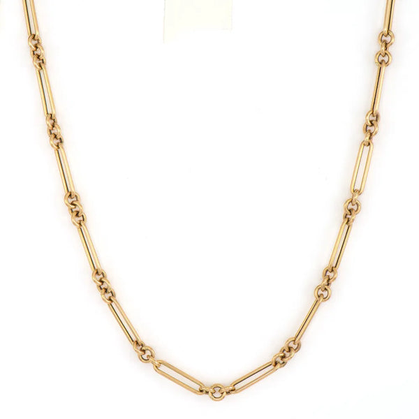 A stunning 14k gold, 16 alternating paperclip chain necklace by Three Stories Jewelry features elongated oval links connected by small round rings in a symmetrical pattern. Displayed on a plain white background, it’s perfect for adding Three Stories charms.