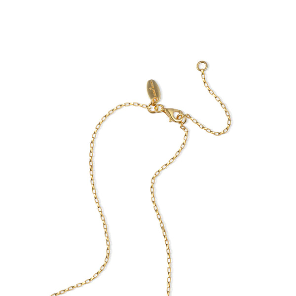 The Oiya Vermeil Link Chain is a delicate gold necklace with a lobster clasp, small oval tag, and subtle extension loop for adjustable length. Its versatile design is shown on a plain white background.