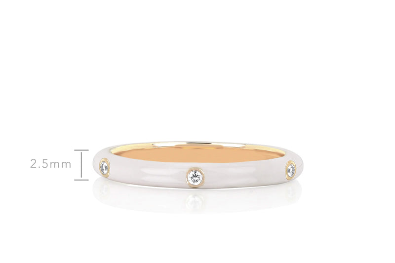 This sleek 3 Diamond Enamel Stack Ring White from ef collection, crafted in 14k gold and measuring 2.5mm wide, features a white enamel finish beautifully embellished with small round diamonds evenly set around the band. The product image is presented on a simple white background.