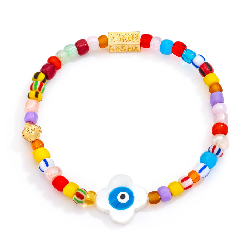 Aaron Bashas Womens Flower Eye Beaded Stretch Bracelet showcases vibrant beads, a floral-shaped evil eye charm, and a gold bead engraved with Aaron Basha. Part of our exclusive handcrafted token collection, this unique piece combines elegance with protection.