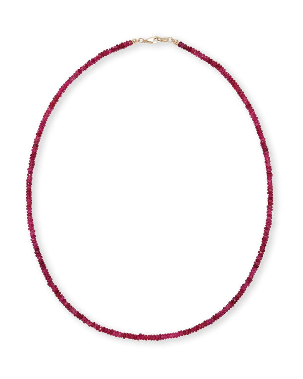 The Tiny Beaded 14k Gold Necklace in Ruby by Lizzie Fortunato features small, round deep red ruby beads strung closely together and finished with a simple 14k gold clasp.