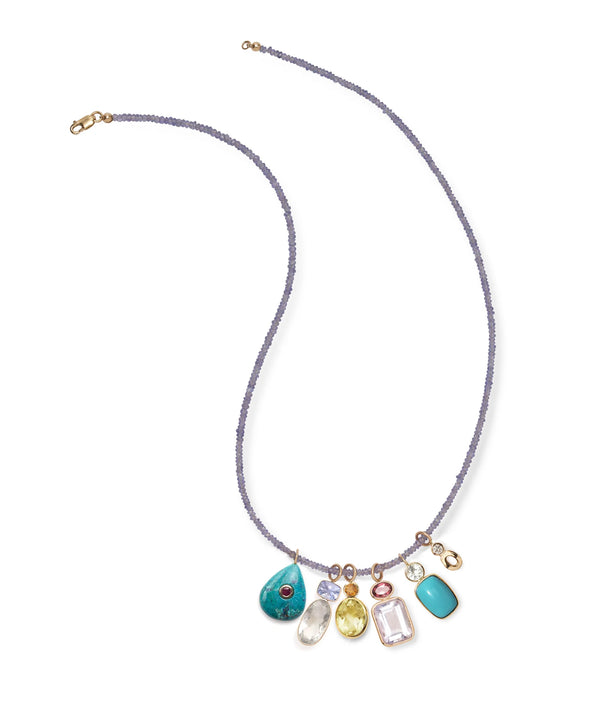 The Lizzie Fortunato Stacked Oblong 14k Gold Necklace Charm showcases green amethyst and turquoise cabochons set in elegant 14k gold, bringing colorful sophistication to any beaded necklace.