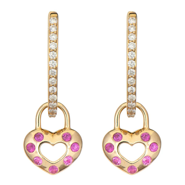 Two Open Love Explosion Double-Sided Heart Charm earrings by Three Stories Jewelry feature gold heart-shaped pendants with pink gemstones and rainbow sapphires. The hoops are adorned with small white stones for added sparkle.