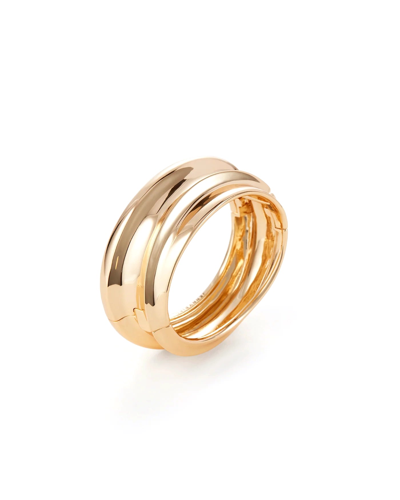 The Mega Lennon Bangle by Jenny Bird features a smooth, rounded design with two overlapping gold bands, reminiscent of a custom bracelet, shown on a white background.