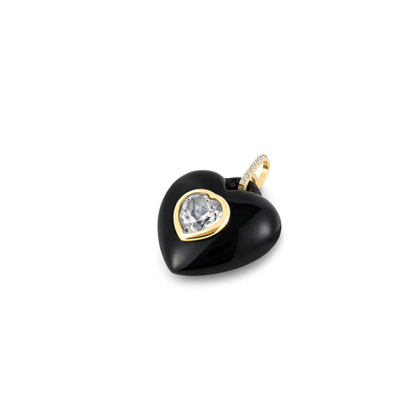 The Kate Collins Jewelry Black Onyx Stone Heart Pendant showcases a heart-shaped black onyx with a gold trim, featuring a central clear white topaz gemstone.