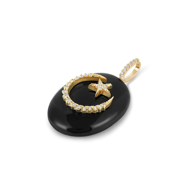 The Large Oval Cabochon Charm-Moon & Star by Kate Collins Jewelry features a gold crescent moon and star with diamonds on a glossy black onyx base, complemented by a diamond-studded bail for necklace attachment.