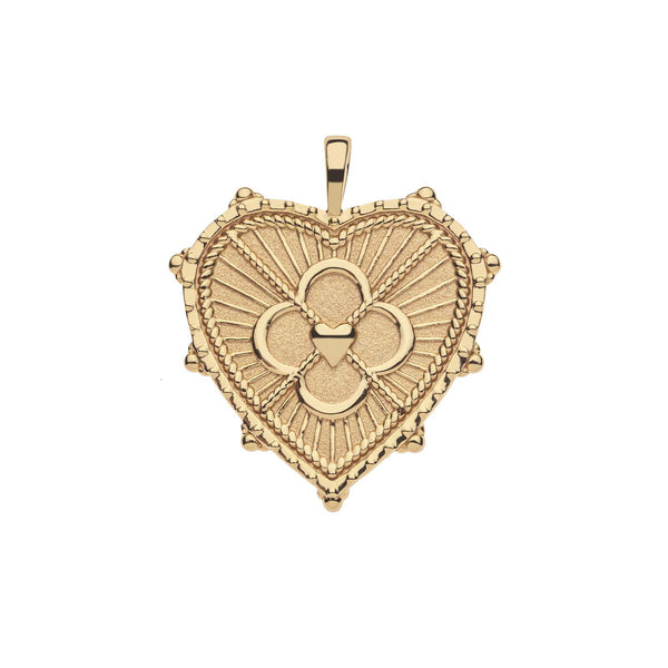 The LOVE JW Quatrefoil Heart Pendant by Jane Win is a 14k gold-plated necklace showcasing intricate designs, highlighted by a central four-leaf clover motif and surrounded by a textured border, elegantly embodying the essence of a love pendant.