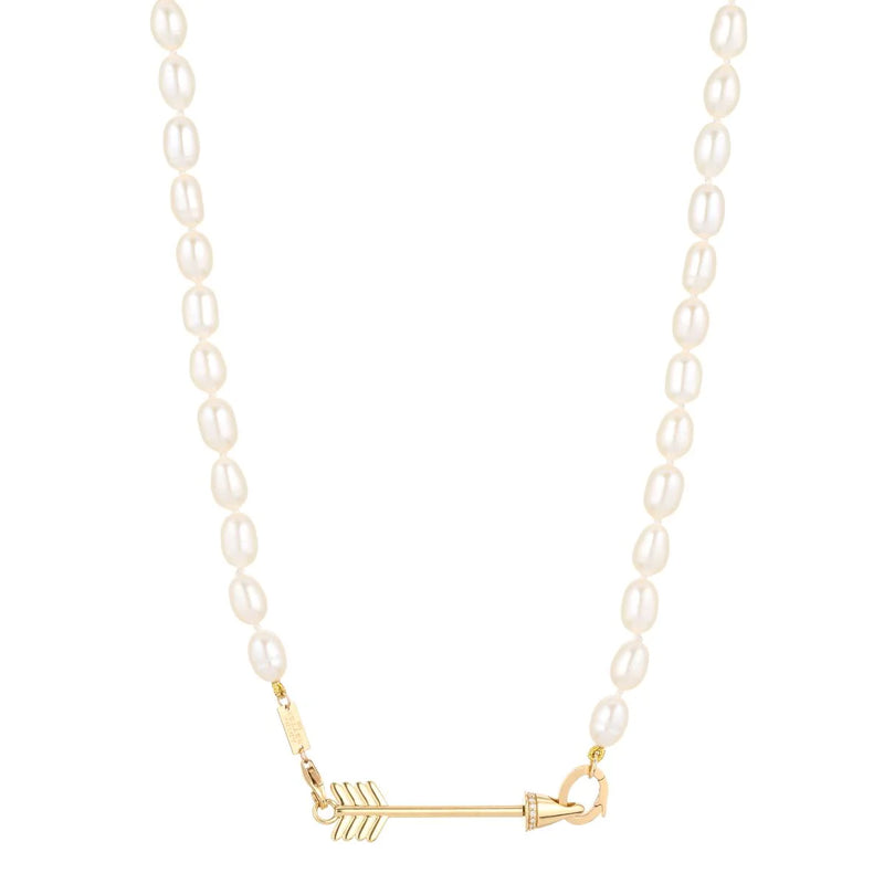 This classic strand by Adina Reyter features oval white pearls and mini beads, highlighted by a Diamond Arrow Hinged Charm for Mini Beads in 14k yellow gold, adding a distinctive and detailed accent at the center.
