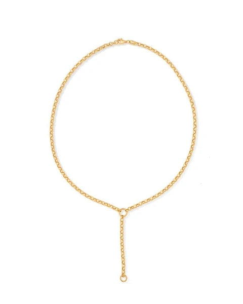 The Adina Reyter Rolo Chain Lariat Necklace is a delicate 14k yellow gold Y-shaped piece with a simple design and a drop chain element hanging from the center.