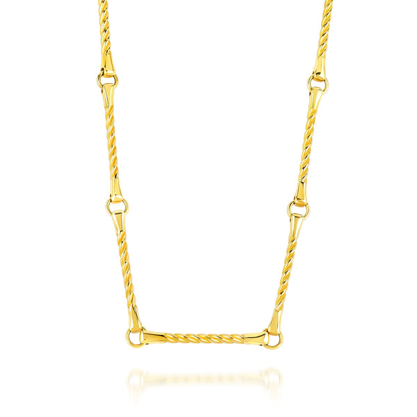 The Twisted Bar Necklace by Kate Collins Jewelry is a gold choker with a twisted rope design and small circular links on a 14k gold chain, set against a white background.