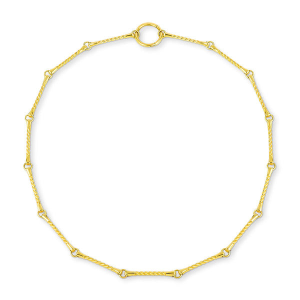 The Twisted Bar Necklace by Kate Collins Jewelry features a 14k gold chain with delicate twisted links and a round clasp, elegantly arranged in a symmetrical pattern.