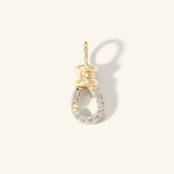 The zahava Pave Diamond Swivel is a 10k gold pendant with a polished top and a pavé diamond-encrusted loop, displayed against a plain light background.