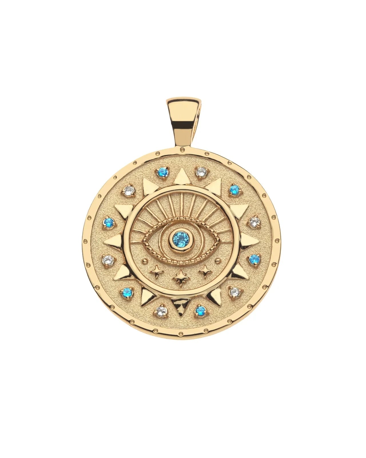 The PROTECT Ancient Eye Pendant by Jane Win is a round gold pendant featuring a raised eye, radiating lines, sparkling stones, and blue sapphires along the edge. This striking piece is available in limited edition.