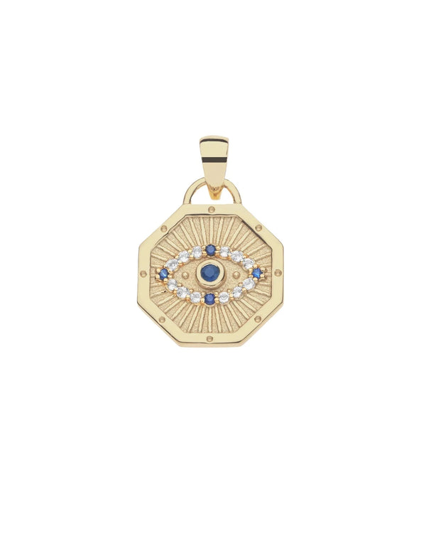 The PROTECT Evil Eye Petite Embellished Pendant by Jane Win is a limited edition gold octagonal pendant with an engraved evil eye, blue and white gemstones, a central blue stone, and a loop for attaching to your necklace.