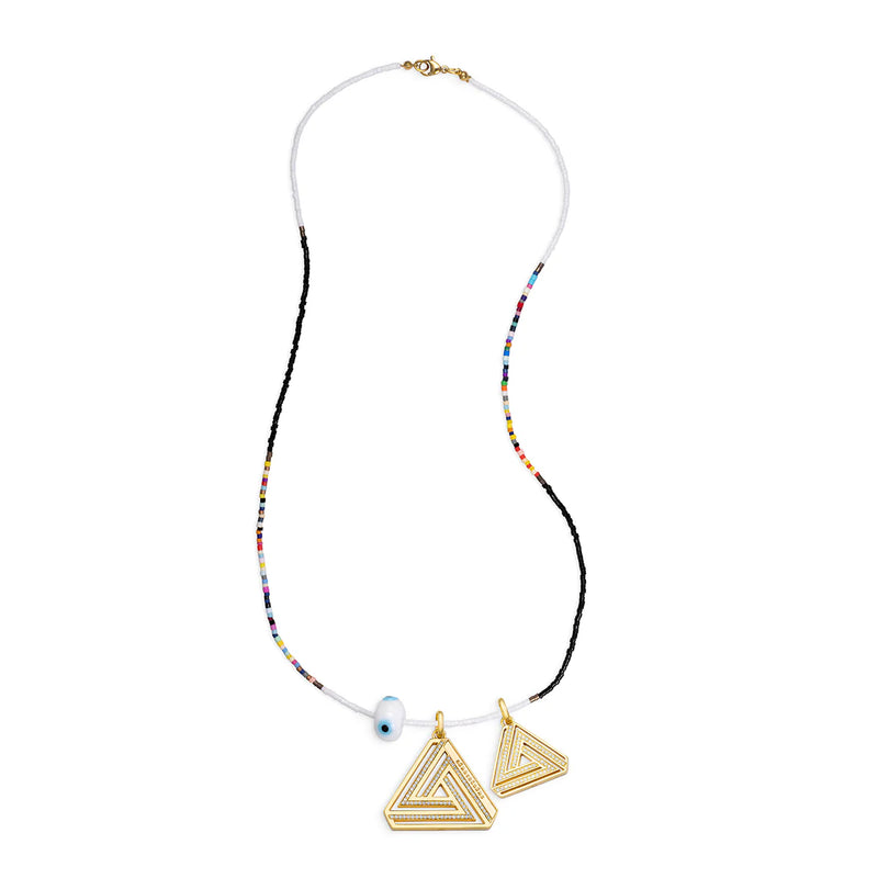 The Helena Eye Necklace by Aaron Basha features a slender vermeil faceted ball chain with colorful beads, an Abracadabra Triangle charm, two gold triangular pendants, and a blue evil eye bead.