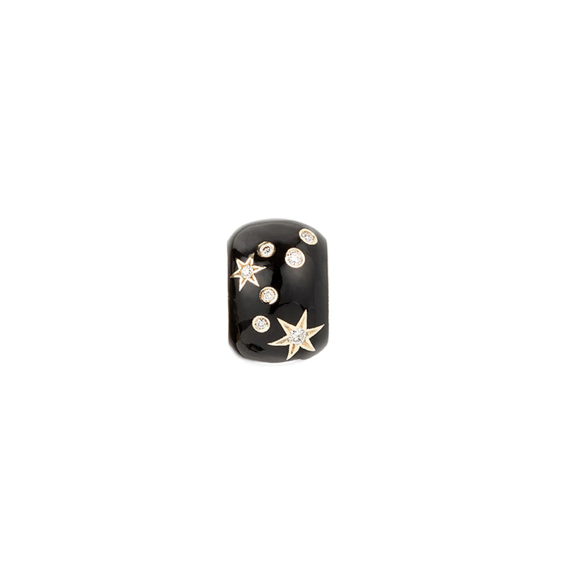 The Adina Reyter Zodiac Ceramic + Diamond Aquarius Big Bead is a rectangular black ceramic ring with gold star and round diamond-like accents, shown on a white background—a bold statement piece for Aquarius.
