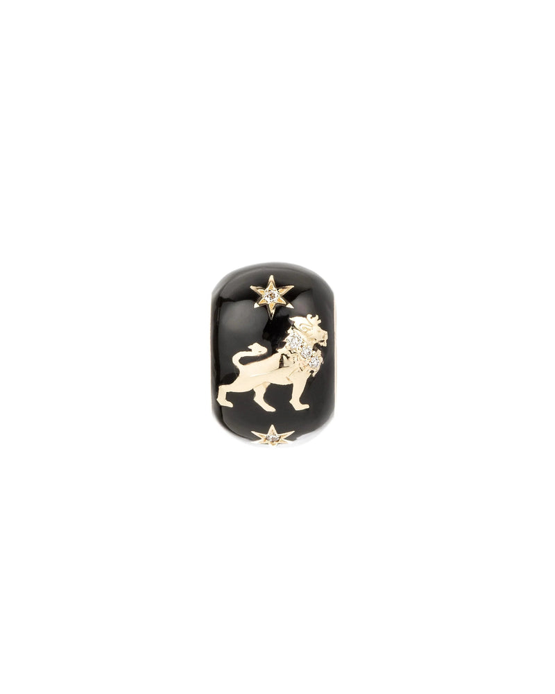 The Adina Reyter Zodiac Ceramic + Diamond Leo Big Bead features a black ceramic base with a gold-tone lion, two gold stars, and sparkling diamond accents for a bold zodiac charm.