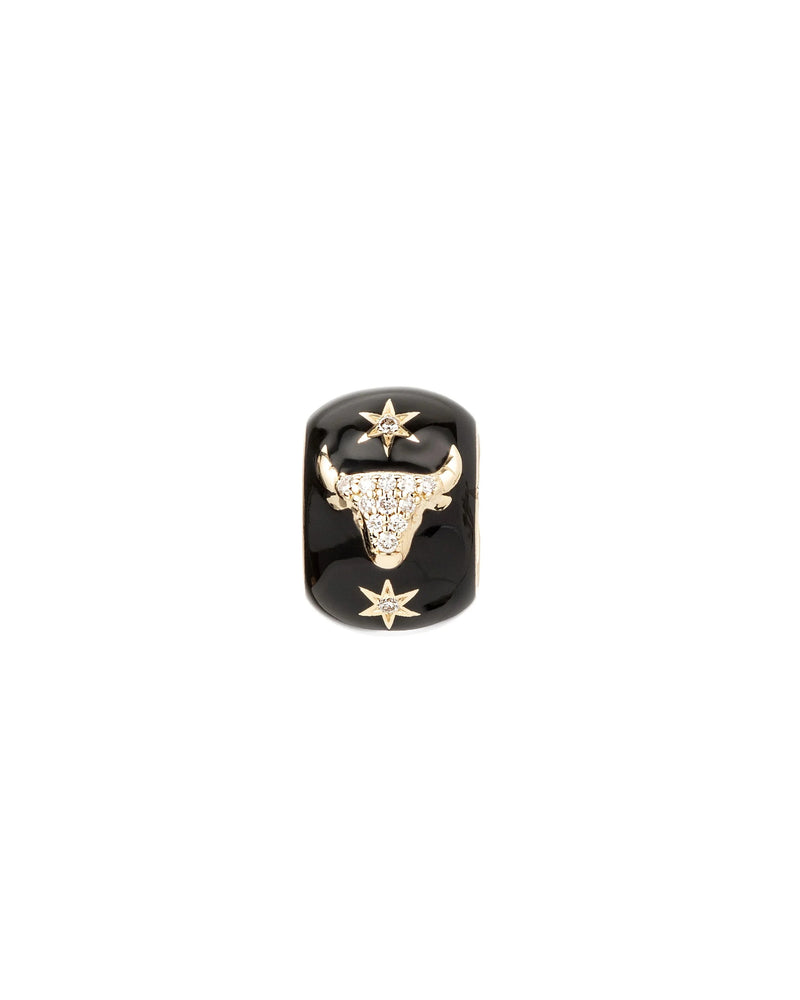 The Adina Reyter Zodiac Ceramic + Diamond Taurus Big Bead features a striking black base with a gold bull head accented by diamonds, plus two gold stars—one above and one below—for a bold zodiac statement.