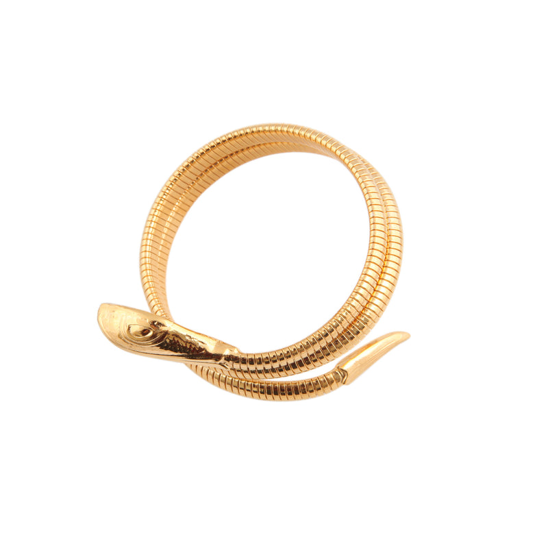 The gas bijoux Serpent bracelet is a flexible snake-inspired piece, featuring detailed scales, a small head at one end and a pointed tail at the other.