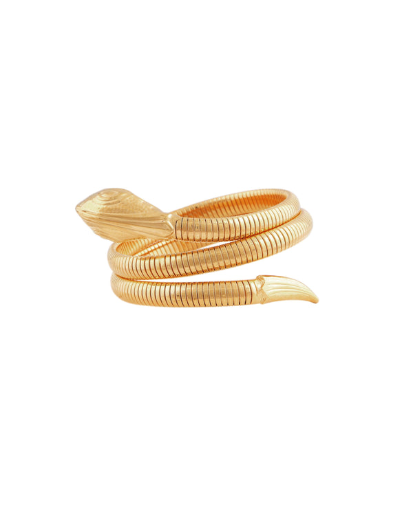 The gas bijoux Serpent bracelet features detailed gold scales, a sculpted head, and pointed tail. This flexible, spiral-shaped bracelet is shown on a white background.