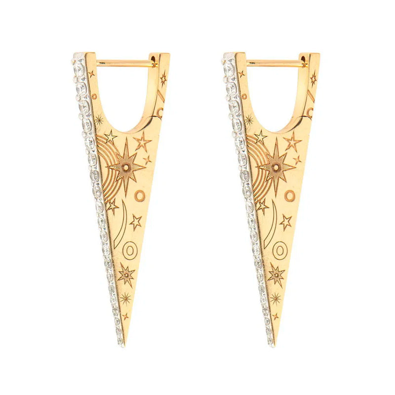 The Elongated Diamond "V" Hoop Earrings by Three Stories Jewelry are 14K yellow gold, triangular hoops with engraved star and sun motifs and a row of sparkling pavé diamonds along one edge.