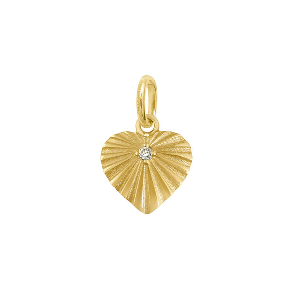 The Gigi Clozeau Heart Lumière Diamond Pendant in 18-carat yellow gold features a heart shape with intricate textured ridges radiating from a central, diamond-like stone and includes a loop for easy attachment to necklaces or bracelets.