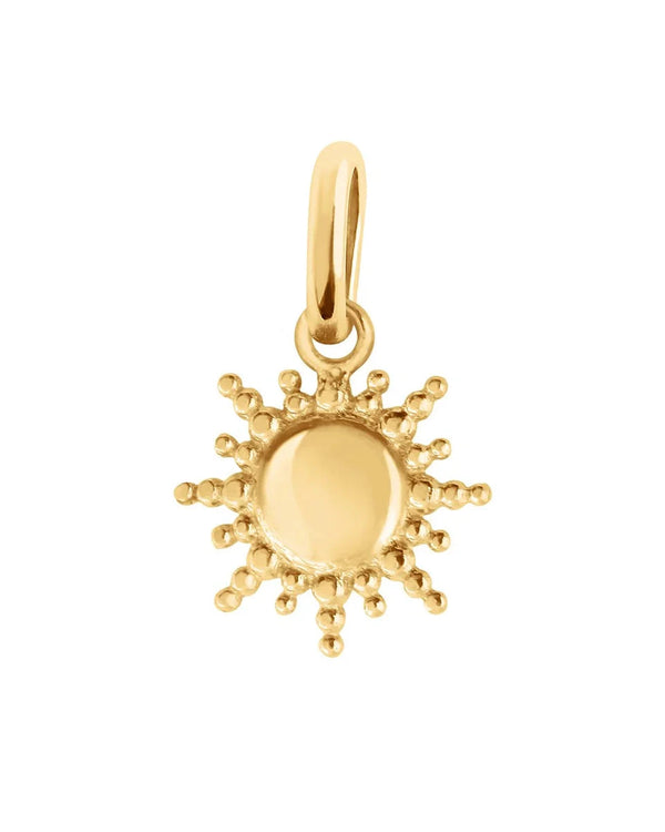 The Gigi Clozeau Sun Pendant is artisan-made in France from 18k gold, showcasing a smooth circular center and radiating round details, all set against a white background.