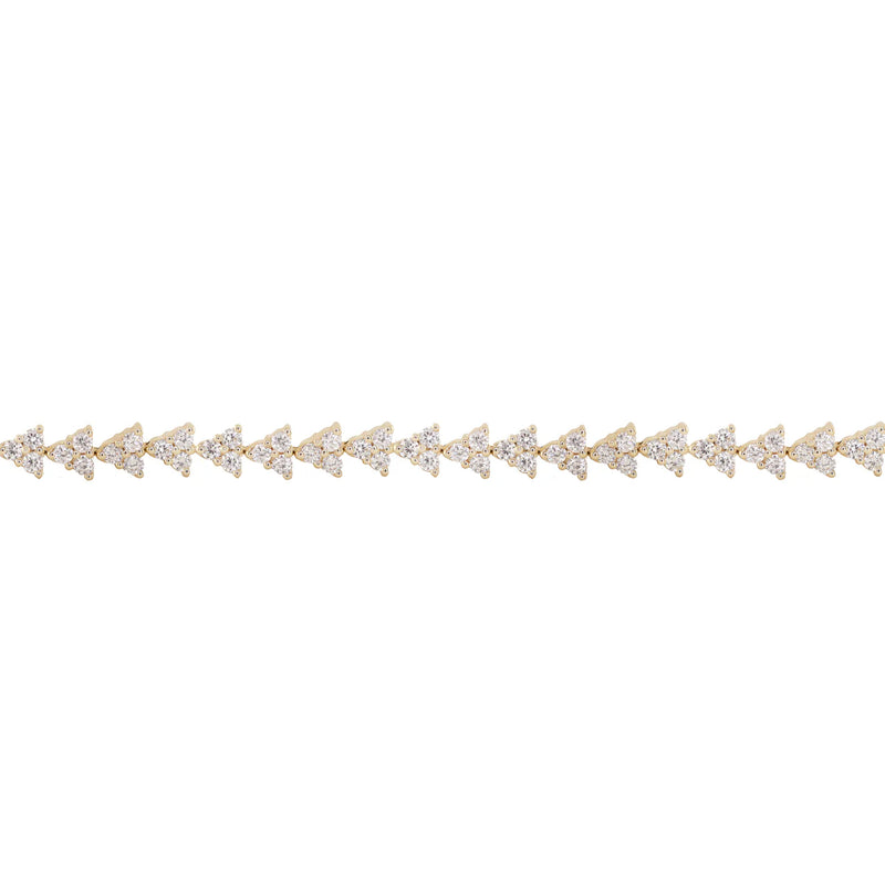The Luna Skye 14kt gold full three diamond cluster tennis bracelet features repeating clusters of sparkling diamonds set in gold, displayed against a plain white background.