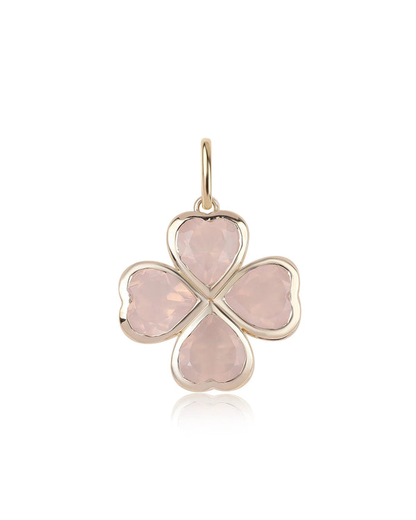 The Rachel Reid Gemstone Clover Charm features faceted rose quartz leaves set in 14k yellow gold and a gold loop for easy attachment to your favorite chain.