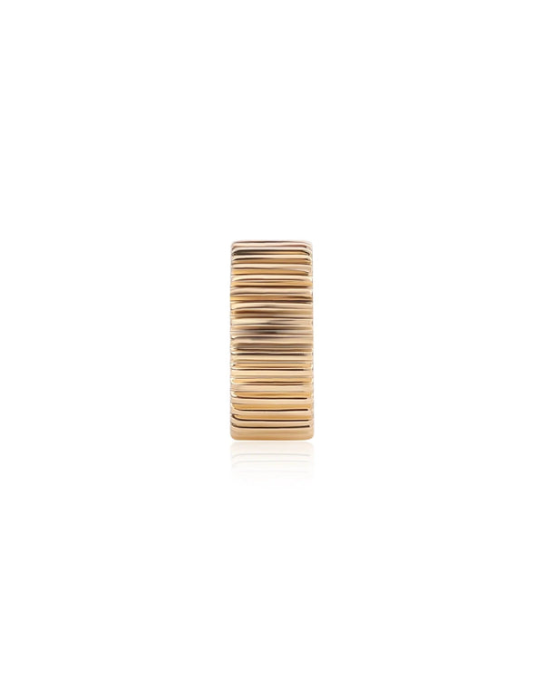 The Rachel Reid Fluted Gold Wheel Charm features a ridged, grooved texture in 14k yellow gold, shown against a plain white background.