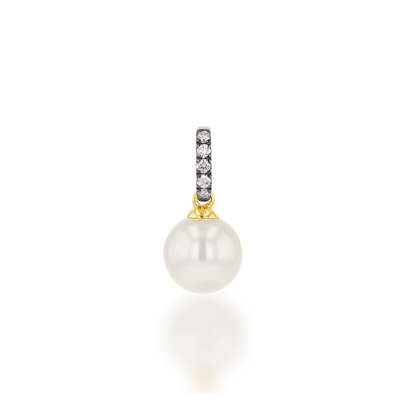 The Rachel Reid Gemstone Charm is a 14k gold pendant with a round white pearl, accented by a gold cap and a diamond-encrusted bail—ideal for layering, shown on a plain white background.