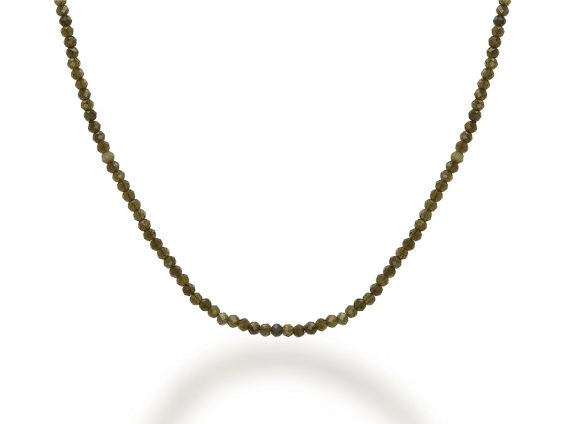 The Rachel Reid 28 Gemstone Bead Necklace features small round olive-green beads in a single strand, crafted in 14K yellow gold and secured with a lobster claw clasp, shown on a white background.