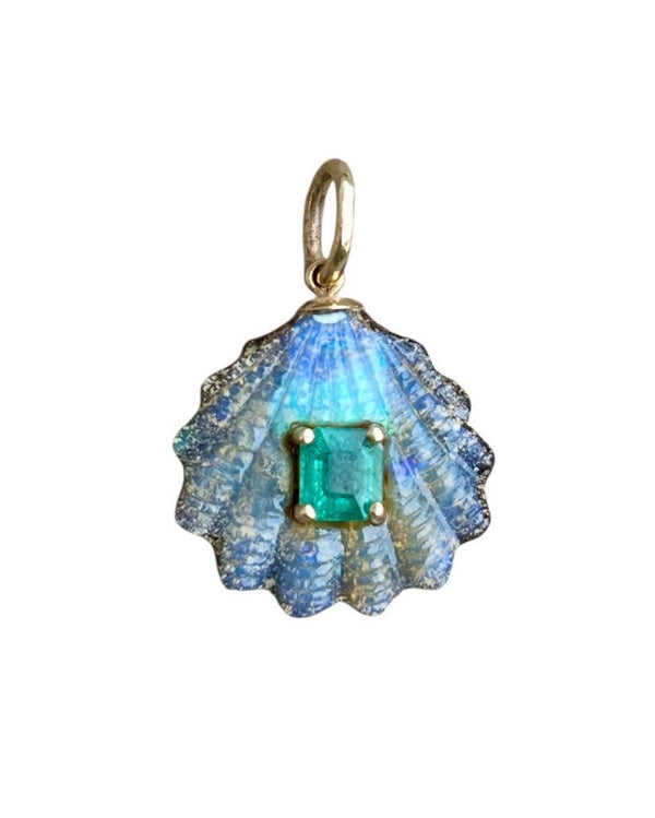 The Jen Proudman Carved Australian Opal Shell Pendant with Emerald is a 14k gold piece shaped like a blue and white seashell, featuring a square-cut green emerald at its center, inspired by the look of carved Australian opal.