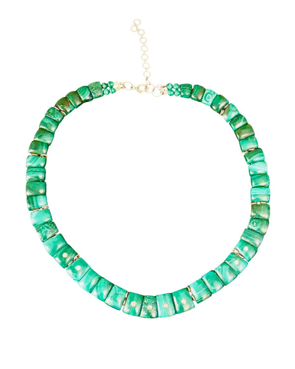 The Mini Cleopatra Collar Necklace by Jen Proudman features rectangular green malachite beads with gold accents and an adjustable clasp, showcasing the stones' natural swirling patterns for a vibrant, polished look.