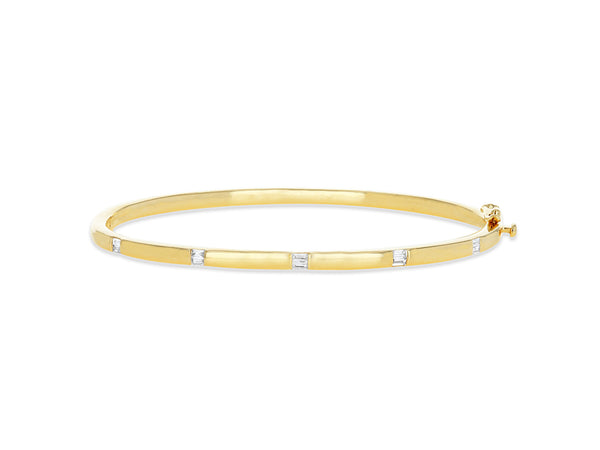 Gold Bangle with diamond baguettes stations